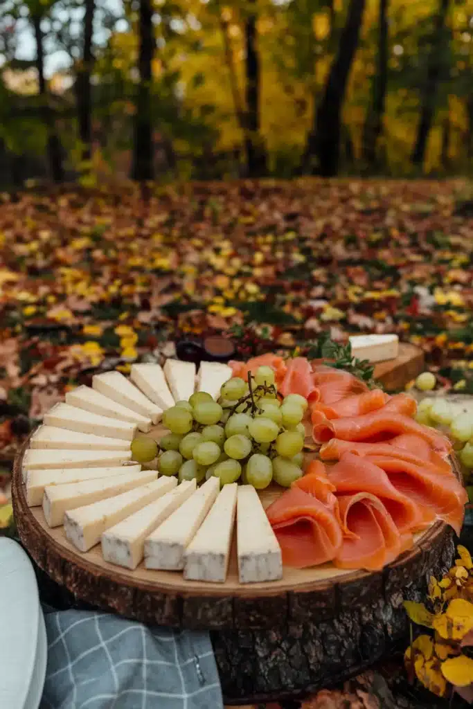Havarti cheese with smoked salmon on a wooden platter.